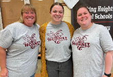 Three teachers in Licking Heights shirts