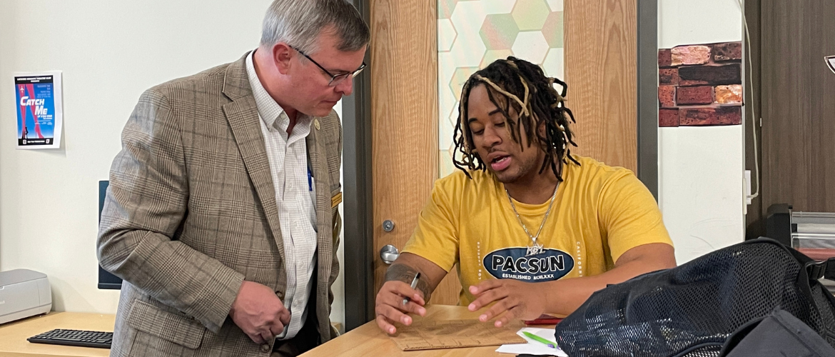 Rep Claggett with a student in Fab Lab