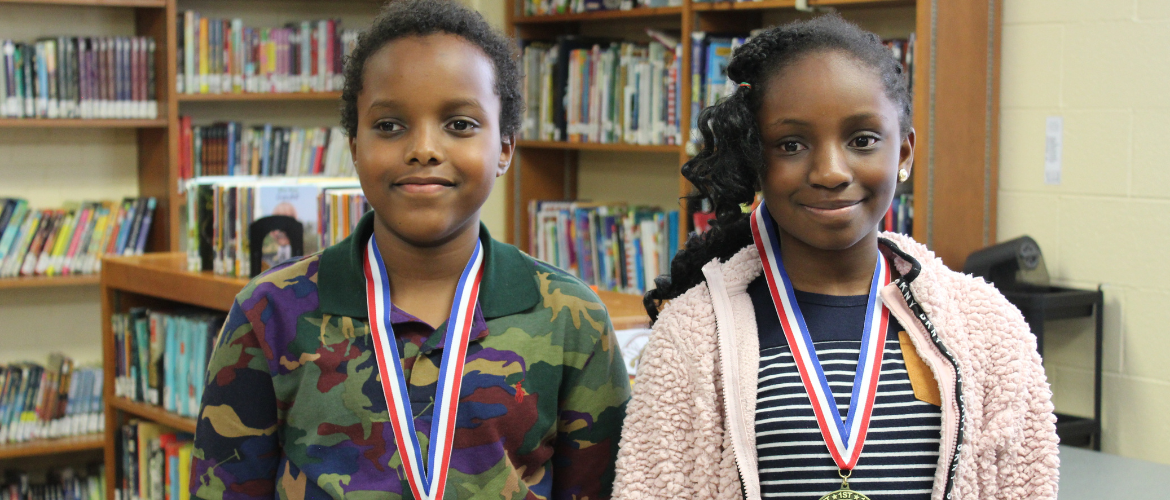 Spelling bee first and second place winners